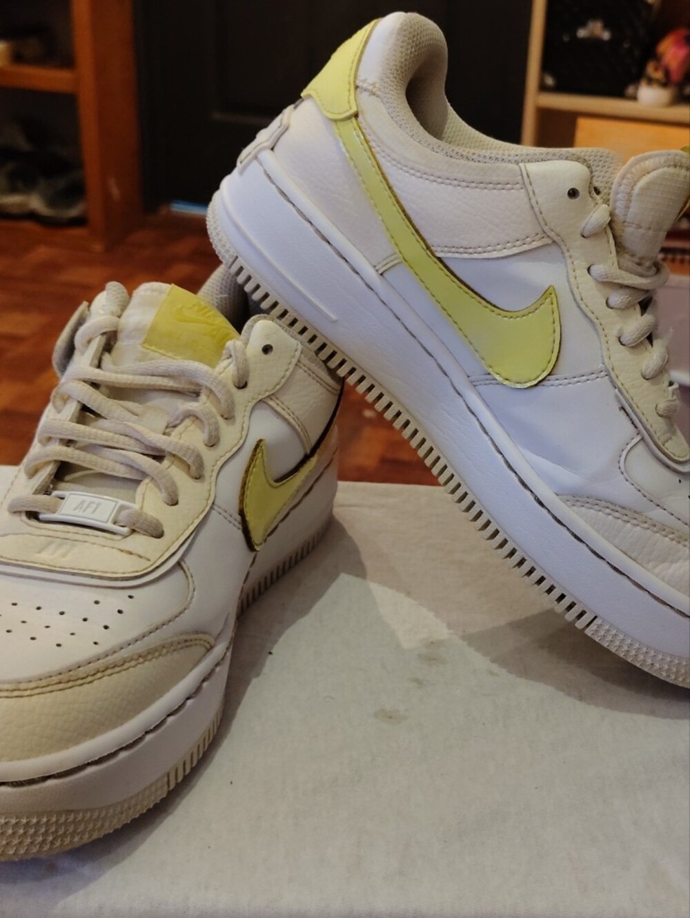Nike White Sneakers with Pale Yellow Accents